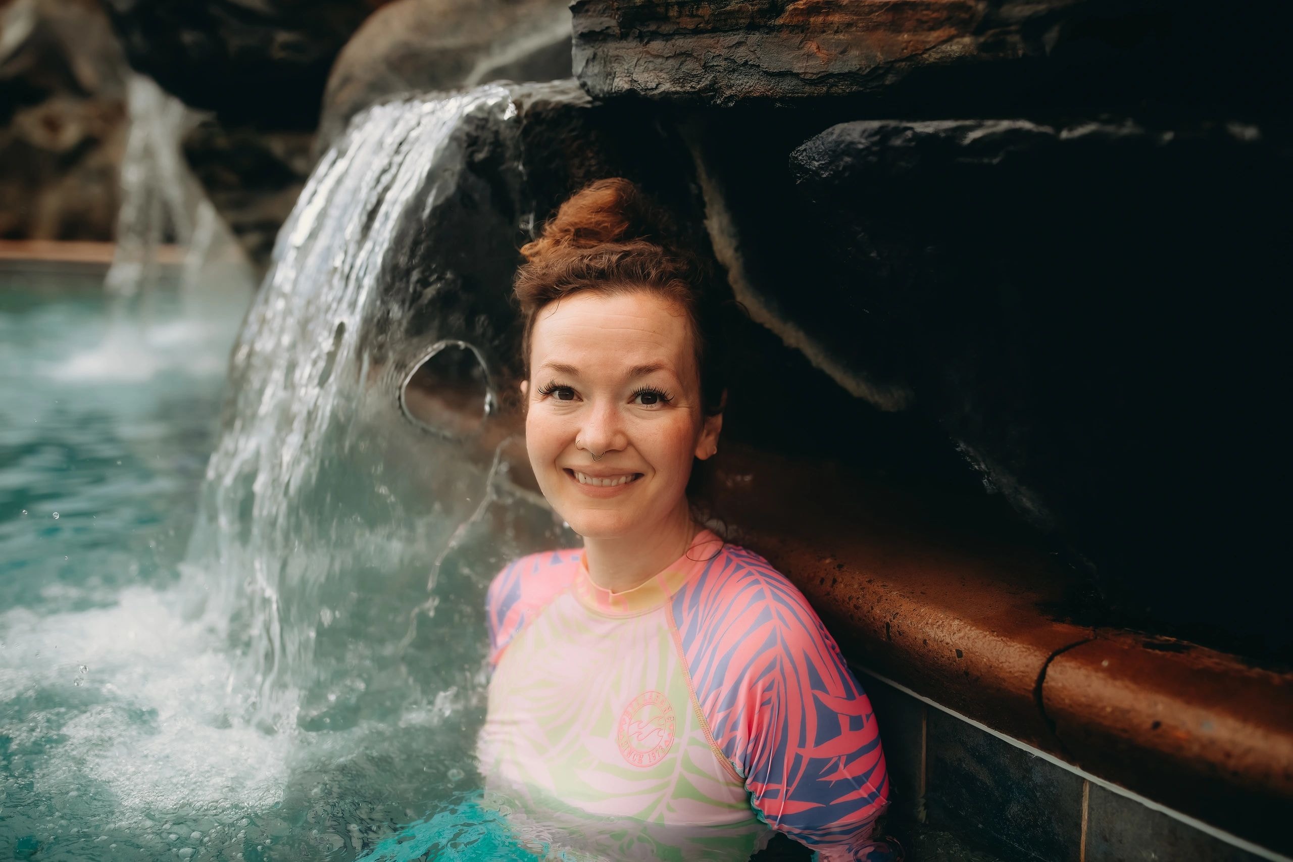Emily at a natural waterfall